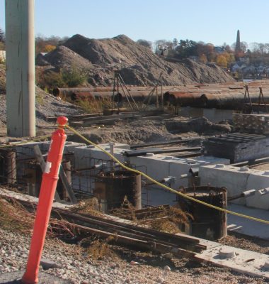 The work at State Pier included filling in a section of the Thames River and adding substructure to make enlarge and strengthen the area for the wind farm components